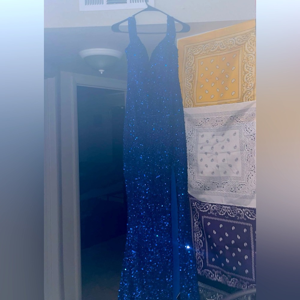 Floor length blue sequined prom dress
